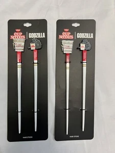 2 confezioni da 2 - tagliatelle Nissin Cup | bastoncini per capelli Godzilla da donna - Foto 1 di 1