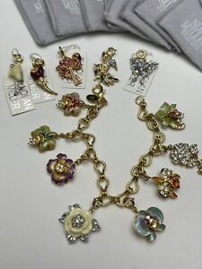 NOLAN MILLER Charm Bracelet with 13 Charms Orchids Flowers Birds Some w Tags