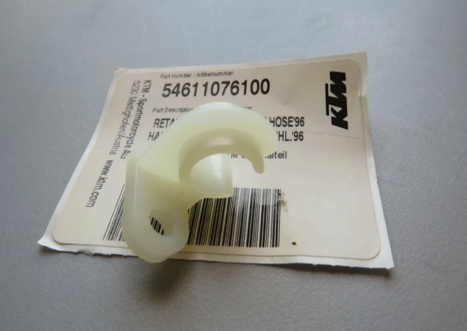Soporte guía manguera freno trasero original NOS KTM 125 250 SX 1996 OEM 54611076100 Foto 1 de 1
