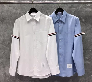 Camisa de solapa de manga larga Thom Browne para hombre y mujer Camisa de moda - Imagen 1 de 37