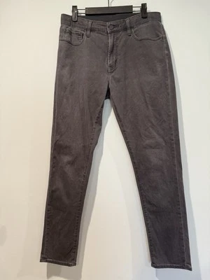 Pantalones Uniqlo Mujer Medianos Gris Oscuro Cremallera y Cintura Elástica Elastizados Viaje Informales Foto 1 de 4