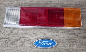 LENTE LUZ TRASERA CONDUCTOR FORD CAPRI MK1 74EG13444 GENUINO NUEVO FORD MUY RARO AHORA - Imagen 1 de 6