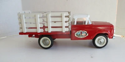 Camión de estacas de granja Ford Happy Acres de colección Nylint Foto 1 de 4