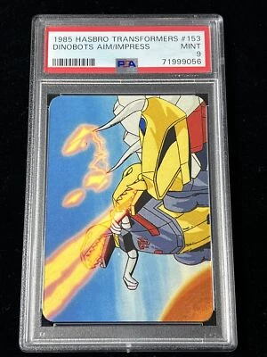 1985 Hasbro Transformers #153 Dinobots Aim To Impress Action Card PSA 9 LOW POP - Image 1 of 3