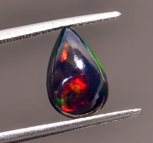 Natural Black Ethiopian Opal Pear Shape Cabochon Loose Gemstone 1.5 Ct 11X7X5 mm - Picture 1 of 3