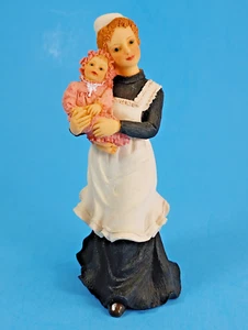 Figura de enfermera de maternidad con bebé infantil por estilo artesanal. - Imagen 1 de 7