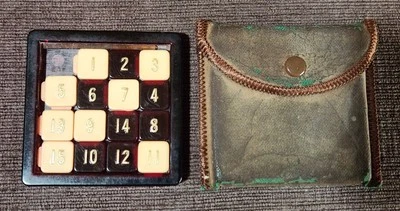 Vintage Bakelite Rudolf Steiner 15 Puzzle w/Case - Image 1 of 3