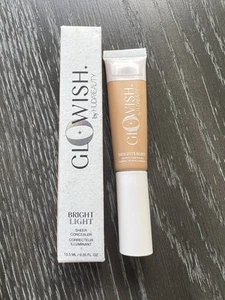 Huda Beauty GloWish correttore trasparente chiaro brillante - 06 marrone medio - 0,35 fl oz nuovo - Foto 1 di 6