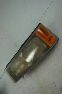 2003 - 2006 Chevrolet Silverado LH Driver Side Headlight OEM 16530969 Used Yello - Picture 1 of 7