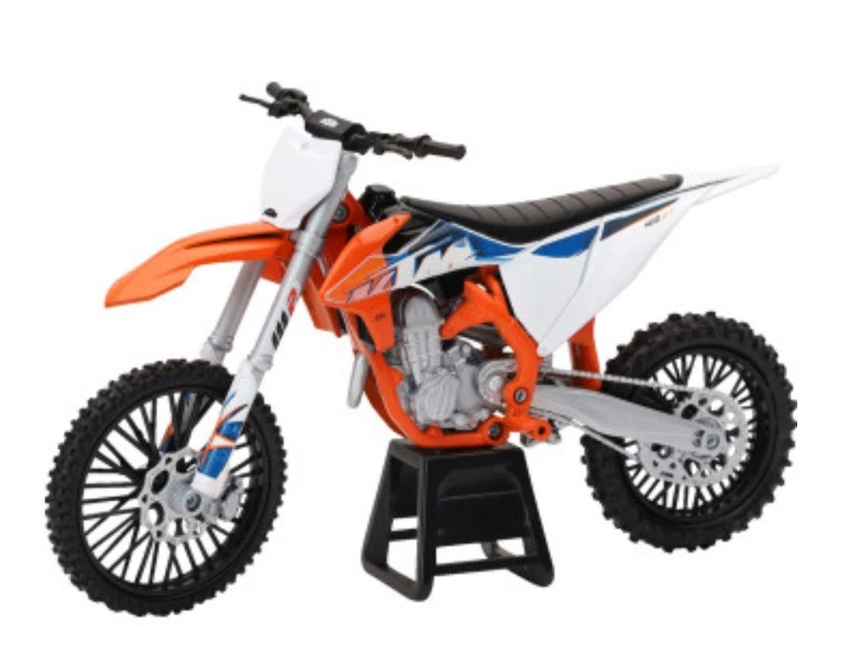 Moto de cross KTM 450 SX-F escala 1:12 naranja/blanco/negro 58343 nueva Ray 7001-0047 Foto 1 de 1