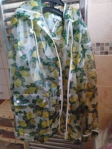 RED HERRING SIZE 18 LEMON PRINT RUBBER RAINCOAT MAC . Used but no rips or tears. - Picture 1 of 2