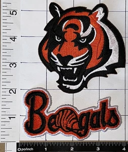 2 VINTAGE CINCINNATI BENGALS TIGER HEAD NFL FOOTBALL PATCH LOT - Bild 1 von 1