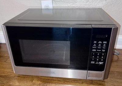 Horno microondas Black+Decker EM925AB9 - 0,9 cúbicos Ft., 900W - Poco uso - Tiene caja Foto 1 de 4