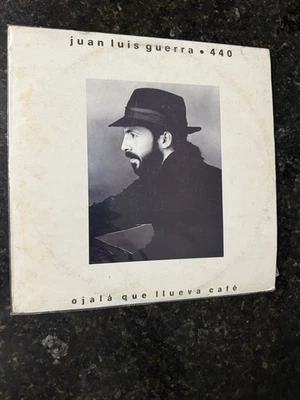 JUAN LUIS GUERRA Y 4:40 “OJALA QUE LLUEVA CAFE” KAREN RECORDS/VG+VINYL !! - Image 1 of 4