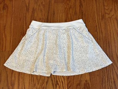 Falda corta Under Armour HeatGear Pickleball con pantalones cortos bolsillos medianos plateada Foto 1 de 4