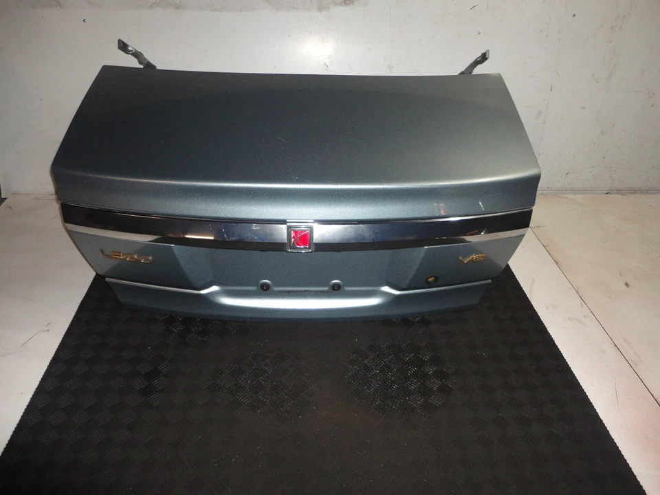 2005 SATURN L300 SEDAN REAR TRUNK LID ICE BLUE 42U U 725H - Image 1 of 4