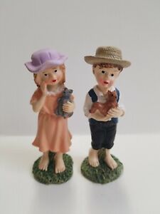 Boy and Girl Garden Statues 4in Resin