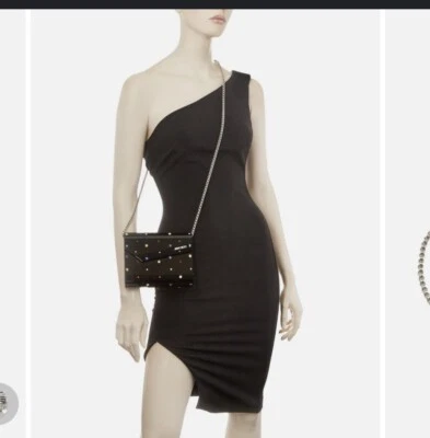 Bolso sin asas Jimmy Choo caramelo negro adorno cristales cadena noche exhibición tienda Foto 1 de 4