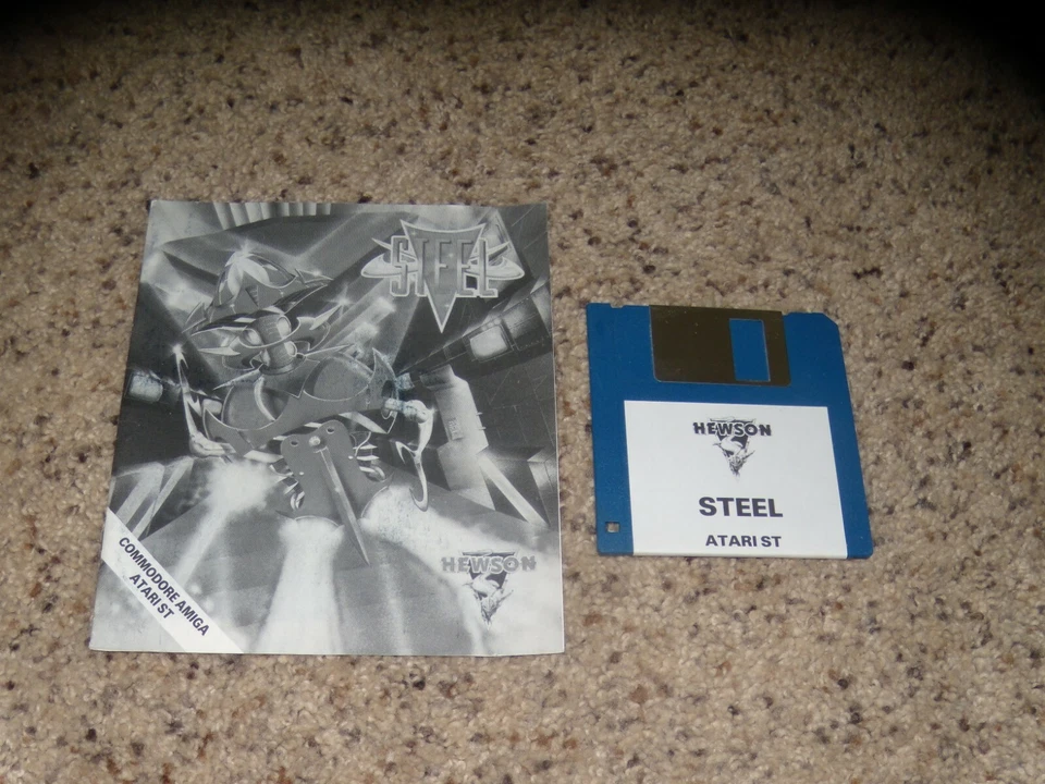 Steel Atari ST on 3.5" disk with instructions - Image 1 of 1