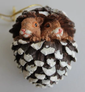 Two Baby Squirrels Peaking out of a Pine Cone W/toys Christmas Ornament - Picture 1 of 3
