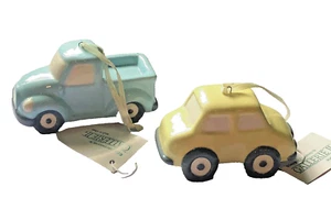 Lote de 2 ~NUEVO RARO ~ Adorno de porcelana para automóvil y camión Nuevo con etiquetas ~ Medio oeste de Cannon of Falls - Imagen 1 de 12