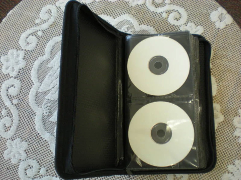 1 件全新人造革 64 光盘 CD DVD 钱包式保护壳,黑色,JS64LE  — 第 1/1 张图片