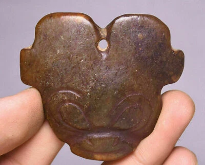 Colgante amuleto cabeza bestia dios sol talla jade antiguo cultura Hongshan de 5,5 cm China Foto 1 de 4