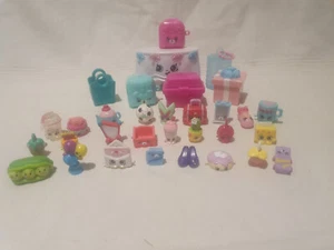 Paquete de 25 figuras + estuches de almacenamiento Shopkins - Imagen 1 de 5