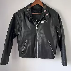 Giacca moto pelle vintage nera con spille donna taglia media mostra usura - Foto 1 di 12