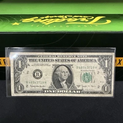 Банкнота номиналом 1 доллар 1963 B с изображением Джозефа Барра банкнота Федерального резерва Нью-Йорк  - Изображение 1 из 3