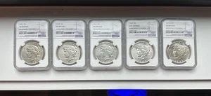 1923-S, 26, 27, 34, & 35 Peace Silver Dollar NGC AU-UNC DETAILS - INV#7357 - Picture 1 of 2