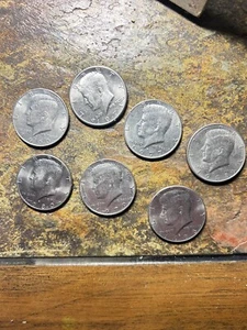 1990, 1986, 1983, 1980, 1979, 1977, 1971 Kennedy Half Dollar 7 Coin Set - Picture 1 of 2