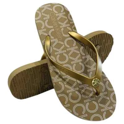 NWT CALVIN KLEIN MSRP $39.99 SARMINYA WOMEN'S GOLD FLIP FLOPS SANDALS SIZE 6 7 - Image 1 of 4