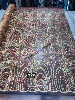 DARK GOLD  SHINY GLITTER WAVE DESIGN ON A printed MESH-PROM-SOLD BY THE YARD. - Image 1 of 4