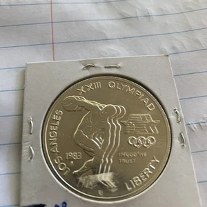 1983-S US 90% Silver Olympic Commemorative Dollar Discus Thrower - Picture 1 of 6