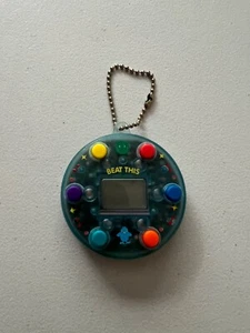 Beat This Electronic Sequence Game Keychain - Picture 1 of 2