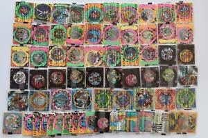 MATUTANO BEYBLADE SPINNERS TAZOS LOTE 57 PRECINTADOS DIFERENTES + 10 REPETIDOS - Imagen 1 de 10
