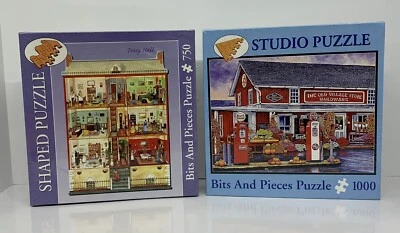 NIB Bits & Pieces Village Hardware Store 1000 Pc & Town  Square 750 Pc Puzzle - Image 1 of 3