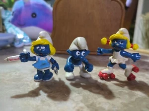 VINTAGE 1980-81 SMURF Lot Of 3 Smurf, Smurfette, Nurse, Skating - Picture 1 of 5