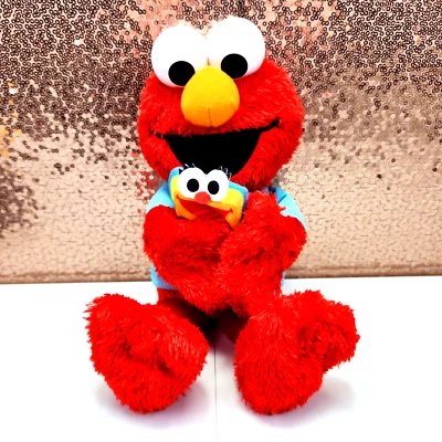 Peluche de juguete a pilas Sesame Street Elmo's World Musical Talking Singing Foto 1 de 4