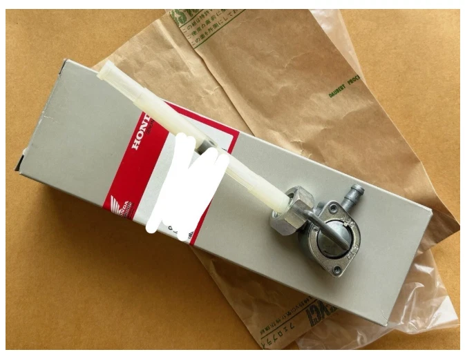 Válvula de palanca de combustible genuino Honda CB400T CB250T CX500 nueva sin usar Foto 1 de 1