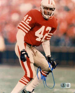 RONNIE LOTT SIGNED AUTOGRAPHED 8x10 PHOTO SAN FRANCISCO 49ERS LEGEND BECKETT BAS - Picture 1 of 2