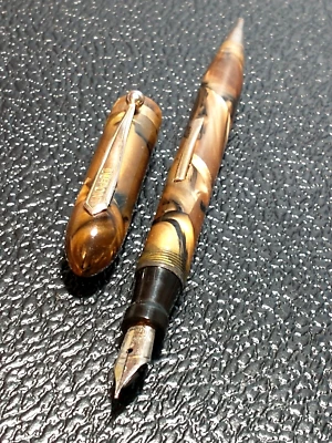 COMBO PLUMA ESTILOGRÁFICA DU-PONT PERLA ORO MARRÓN Y NEGRO CELULOIDE VINTAGE FINA NUEVA EN CAJA Foto 1 de 4