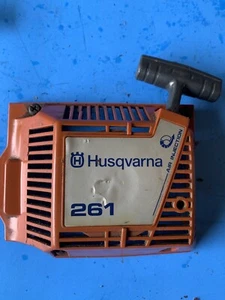 Husqvarna 261 Chainsaw Used OEM Recoil Starter Assembly Small Crack Bin 45 - Picture 1 of 3