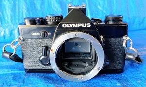 Cámara Olympus OM-2N OM2N negra 35 mm SLR película vintage con zapata caliente - solo cuerpo - Imagen 1 de 15