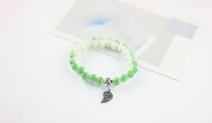Fish Eye Bead Bracelet With Silver Leaf Charm Fashion Jewellery 4 Colours - Picture 1 of 10