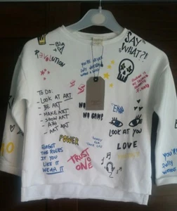 Felpa ragazzo ZARA maglione girocollo stampa slogan orlo grezzo polsino arrotolato 6 anni - Foto 1 di 4