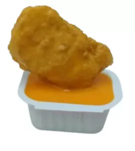 Display Fake Food Prop Chicken Nugget Suspended In Buffalo Sauce - Picture 1 of 2