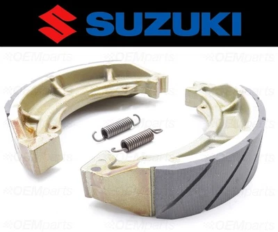 Set of (2) Suzuki Water Grooved FRONT Brake Shoes and Springs #54401-07810 - Image 1 of 4