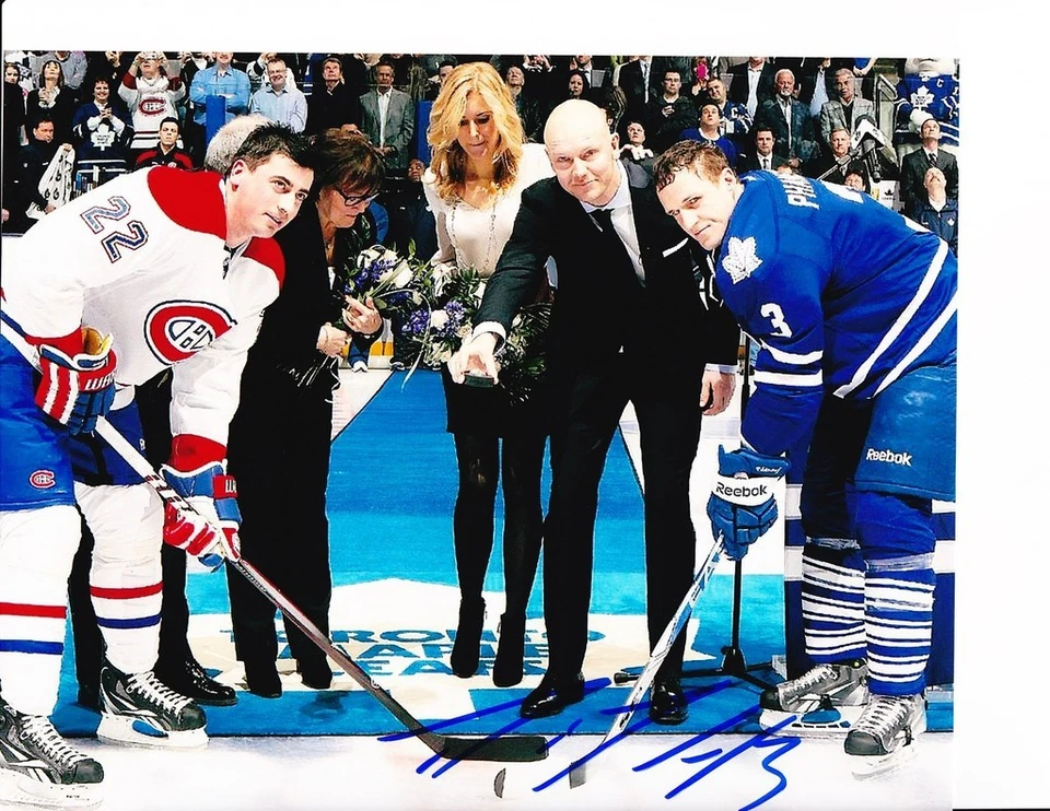 TORONTO MAPLE LEAFS DION PHANEUF SIGNED FACEOFF 8X10 - Image 1 of 1